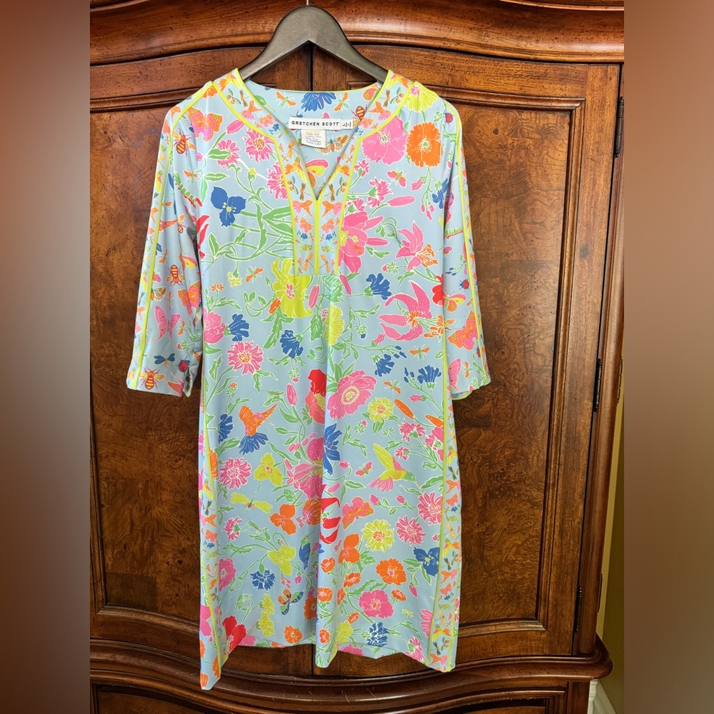 Perfect dress that is so comfortable.    Polyester and spandex.     Machine wash